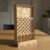 Studio shot of the custom tabletop prize drop board standing on its built-in kickstand