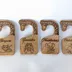 Another angle on the giraffe-neck dividers, showing the hook curve and the natural variation between boards