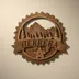 Layered walnut-stained mountain name sign hanging on a warm neutral wall, the open sky cut-outs showing the wall through them