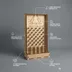 Labeled diagram of the Baltic birch drop board calling out pegs, slot dividers, and engraved features